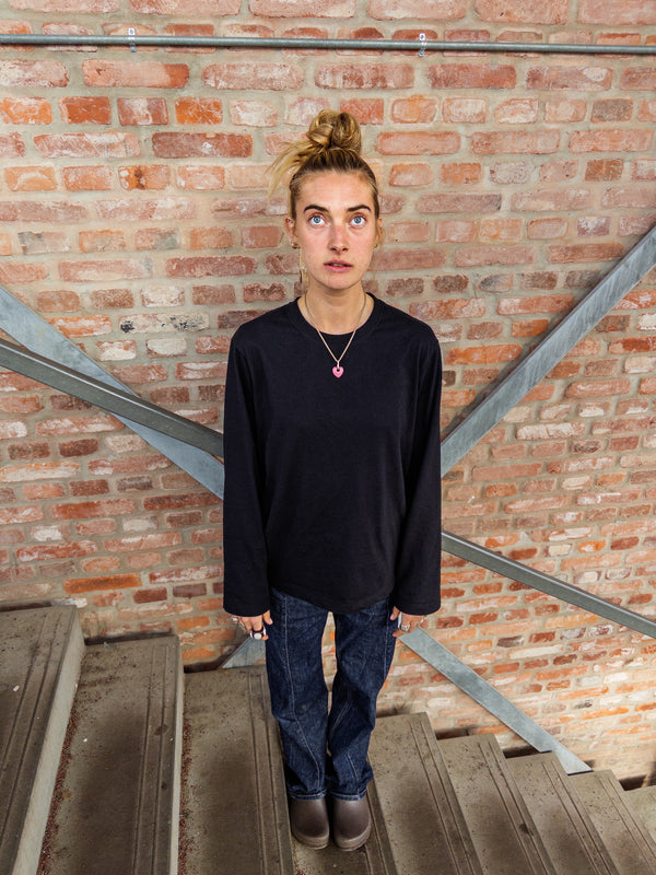 Alma is 174 cm tall and wears size M. | black