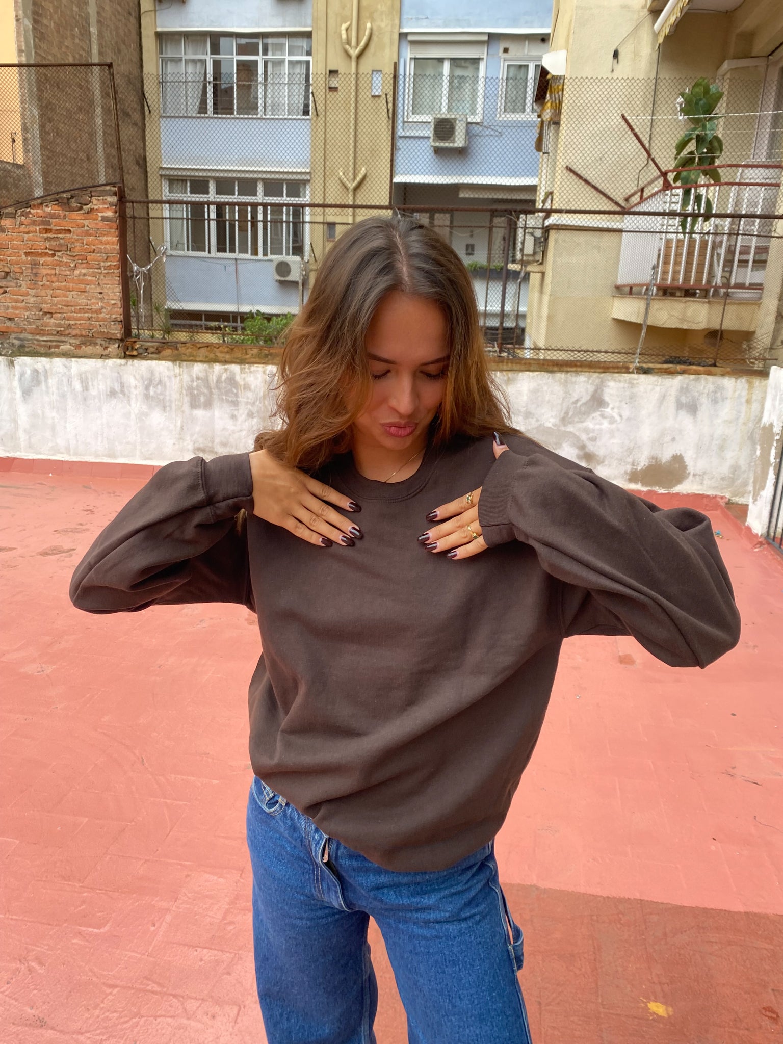 Nadia is 170 cm tall and wears size M. | dark brown