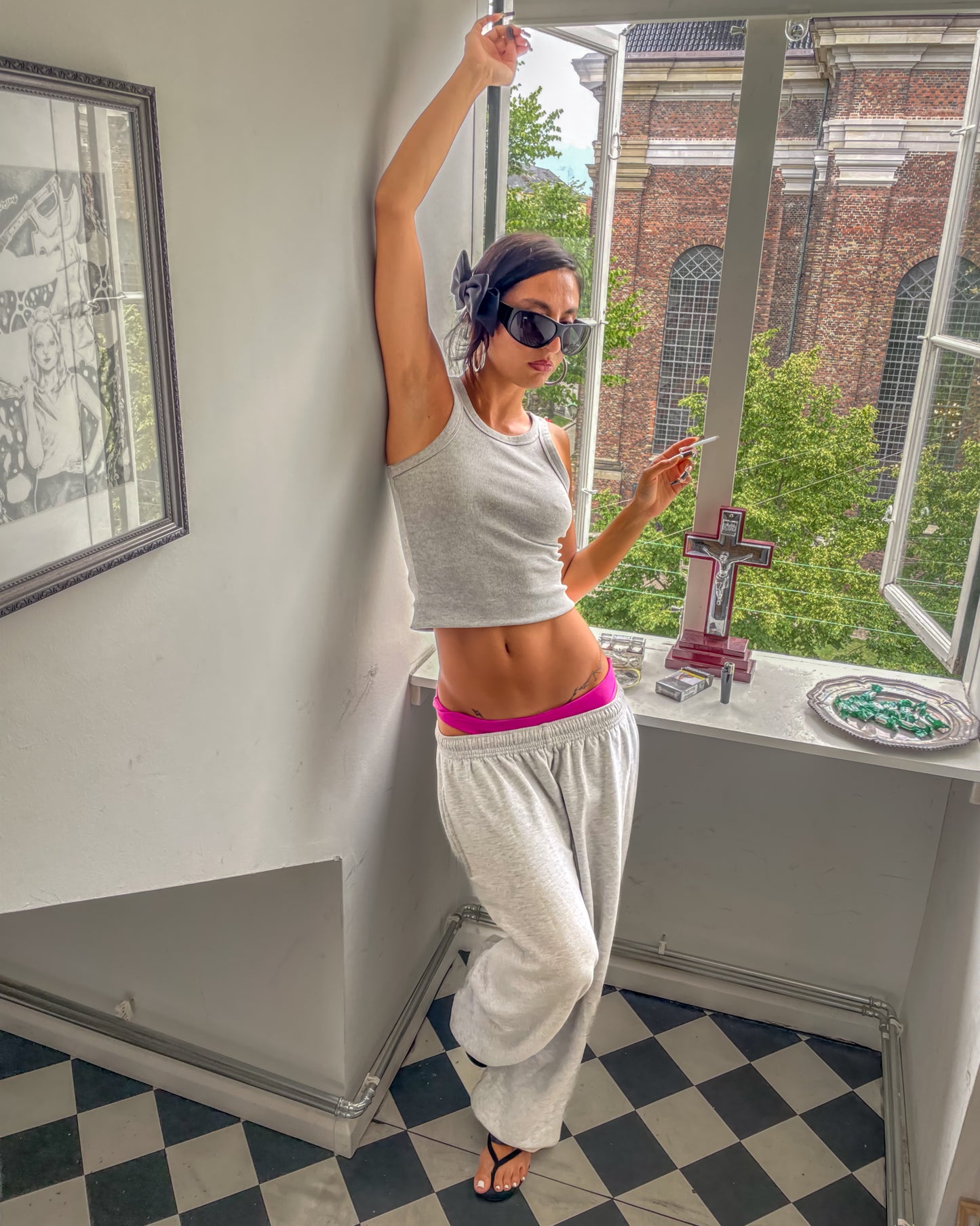 Parnoosh is 165 cm tall and wears size M. | grey